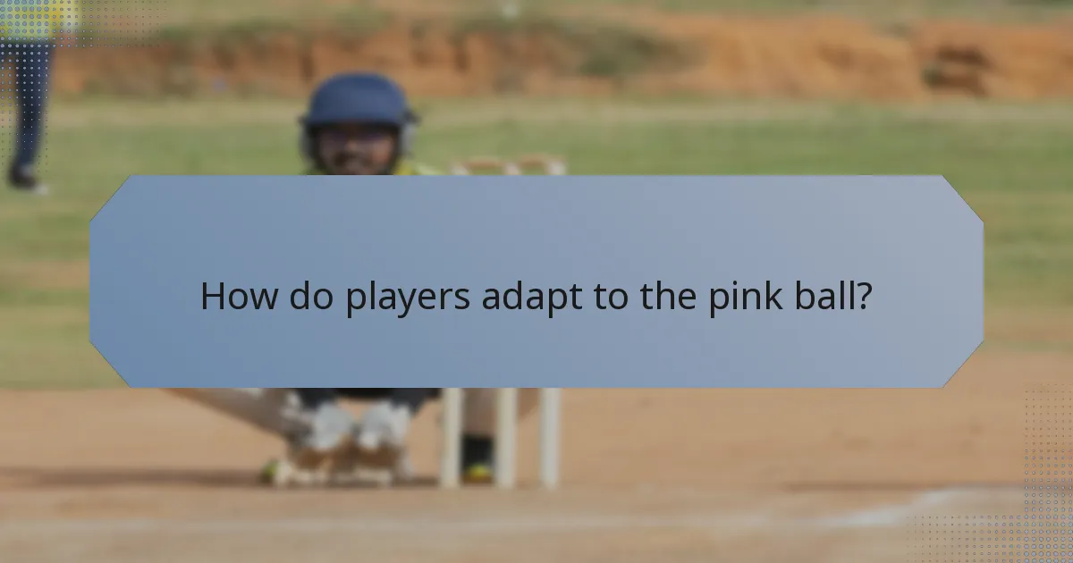 How do players adapt to the pink ball?